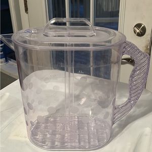 Pampered chef’s clear tea pitcher. Never use so time to pass it on 😁